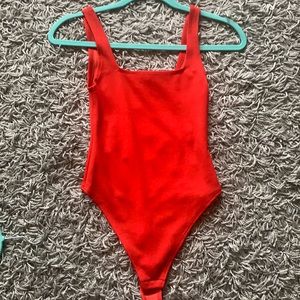Red ASOS bodysuit with square neckline